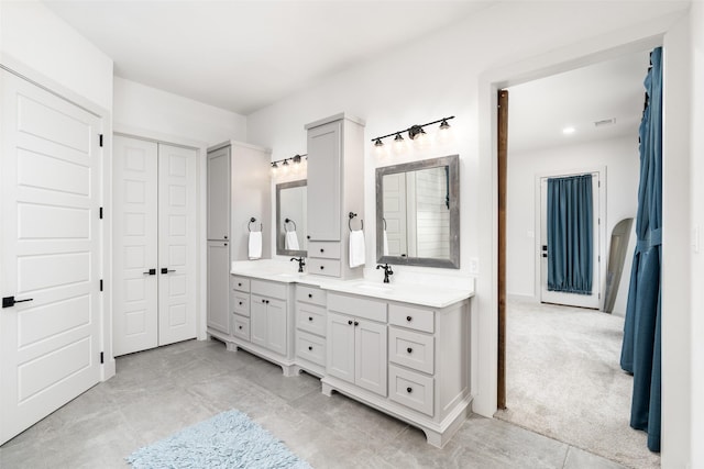 3200 W Fm 455, Celina, TX 75009 - bathroom featuring double vanity, a sink, and visible vents