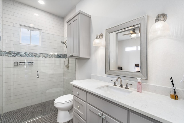 3200 W Fm 455, Celina, TX 75009 - bathroom featuring a wealth of natural light, a stall shower, vanity, and toilet