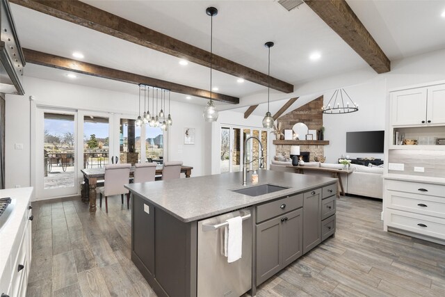 3200 W Fm 455, Celina, TX 75009 - kitchen featuring pendant lighting, stainless steel dishwasher, a sink, and white cabinets
