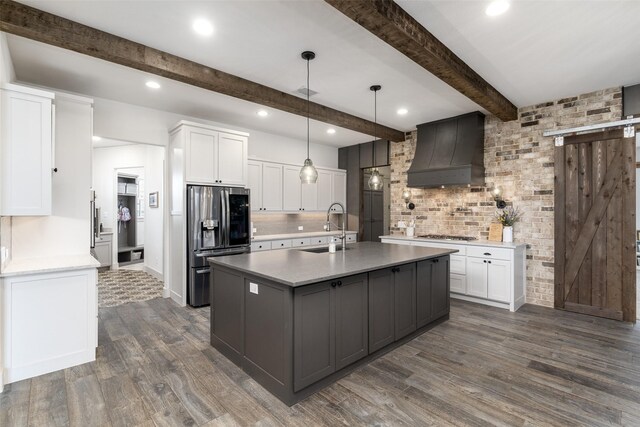 3200 W Fm 455, Celina, TX 75009 - kitchen with stainless steel appliances, white cabinetry, a sink, and custom exhaust hood