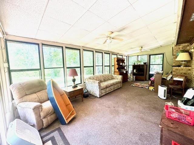 23319 Penninsula Pt, Frankston, TX 75763 - sunroom featuring ceiling fan and carpet flooring