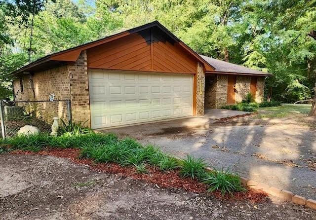 exterior space featuring driveway