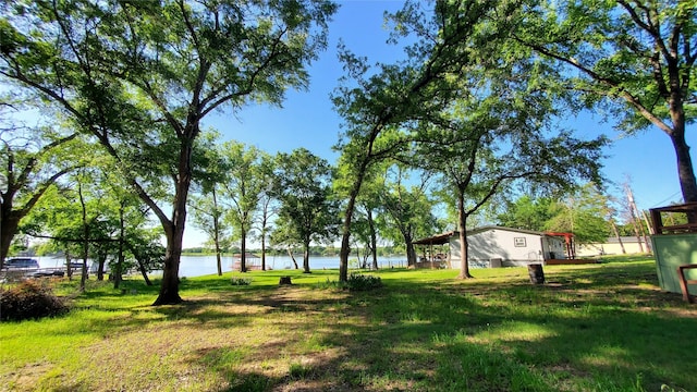 view of yard with a water view