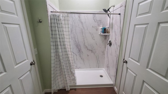 bathroom featuring a stall shower