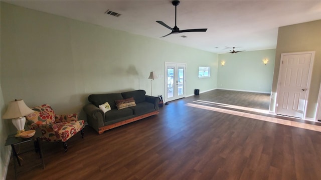 living area with french doors, visible vents, dark wood-type flooring, ceiling fan, and baseboards