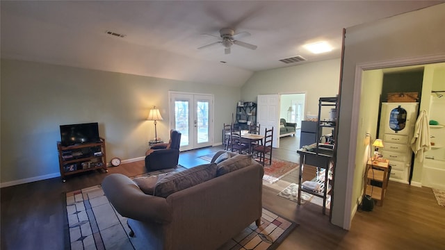 living room featuring dark wood-style floors, french doors, visible vents, a ceiling fan, and vaulted ceiling