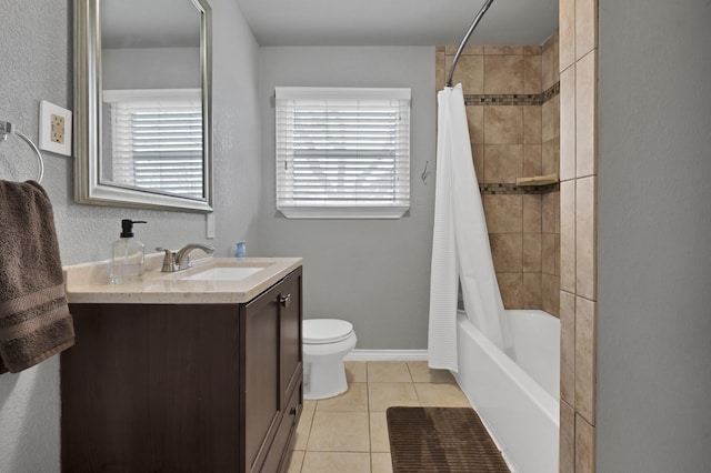 full bathroom with shower / bath combo, baseboards, toilet, tile patterned flooring, and vanity