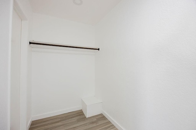 spacious closet with light wood-style flooring