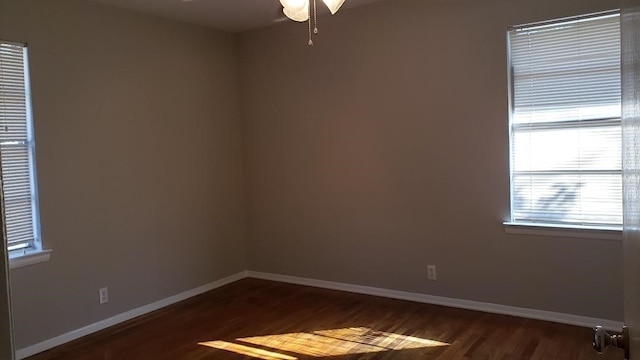 3304 Avon Dr, Denton, TX 76209 - unfurnished room featuring dark wood-type flooring, a ceiling fan, and baseboards
