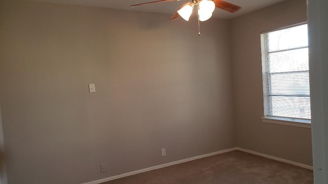 3304 Avon Dr, Denton, TX 76209 - empty room featuring a ceiling fan, plenty of natural light, carpet floors, and baseboards