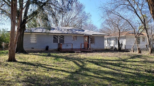 3304 Avon Dr, Denton, TX 76209 - back of house featuring a wooden deck, crawl space, and brick siding