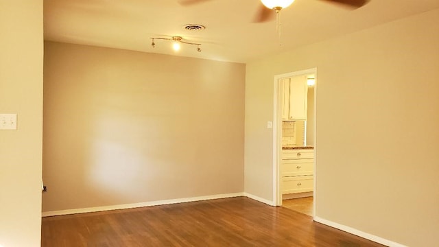 3304 Avon Dr, Denton, TX 76209 - unfurnished room featuring wood finished floors, a ceiling fan, and baseboards