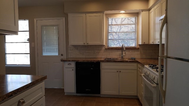 3304 Avon Dr, Denton, TX 76209 - kitchen with white appliances, a sink, plenty of natural light, and white cabinetry