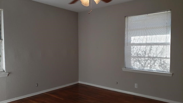 3304 Avon Dr, Denton, TX 76209 - spare room with a ceiling fan, dark wood-style flooring, and baseboards