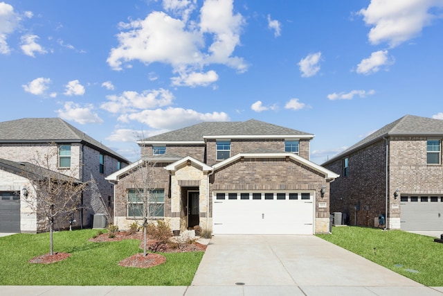 traditional-style home featuring an attached garage, central AC, brick siding, driveway, and a front yard