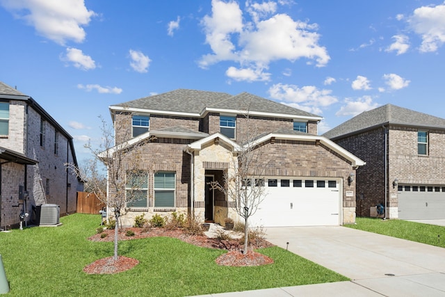 traditional-style home with brick siding, roof with shingles, a front yard, a garage, and driveway