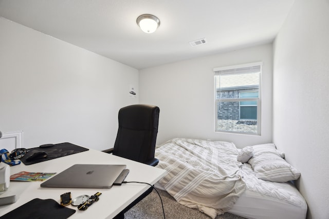 bedroom featuring visible vents