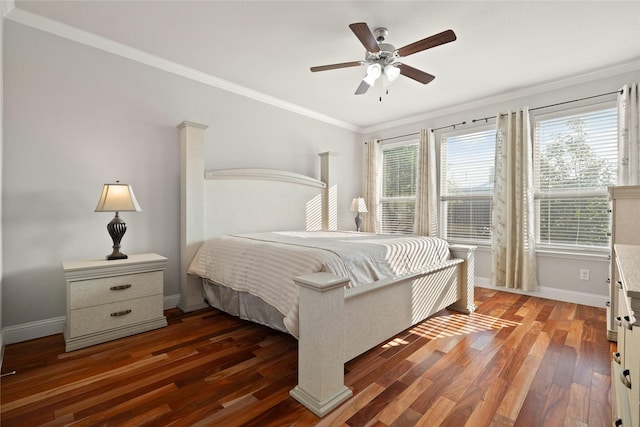 bedroom with dark wood-style floors, ceiling fan, baseboards, and crown molding