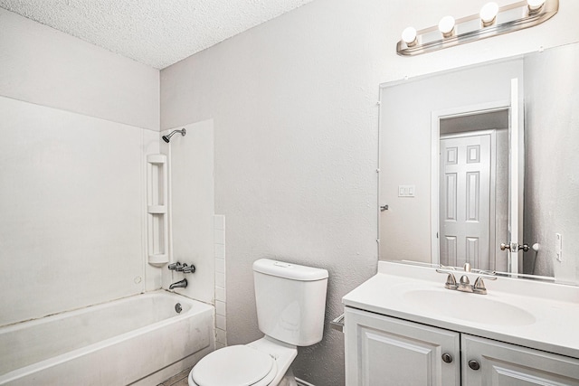 full bathroom featuring a textured wall, toilet, a textured ceiling, vanity, and shower / washtub combination