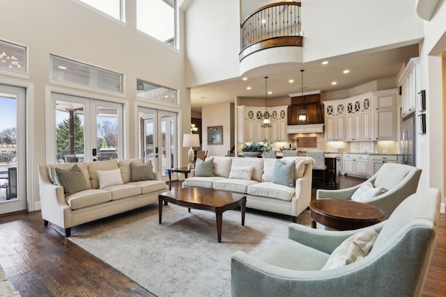 living area featuring french doors and dark wood-style flooring