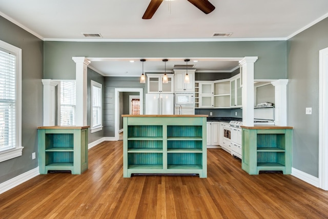 kitchen featuring open shelves, white appliances, glass insert cabinets, and white cabinetry