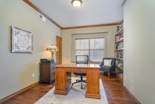 home office with baseboards, visible vents, dark wood-type flooring, and ornamental molding