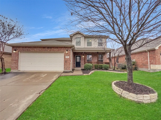 traditional home featuring an attached garage, concrete driveway, brick siding, and a front yard