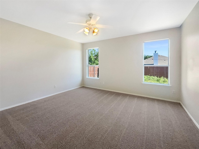 1825 Heron Dr, Aubrey, TX 76227 - unfurnished room featuring baseboards, a ceiling fan, and carpet floors
