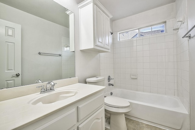 bathroom featuring shower / bath combination, vanity, and toilet