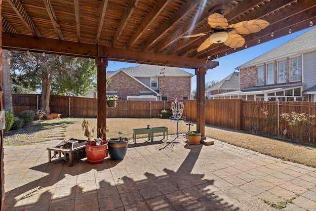 view of patio / terrace with a ceiling fan and a fenced backyard