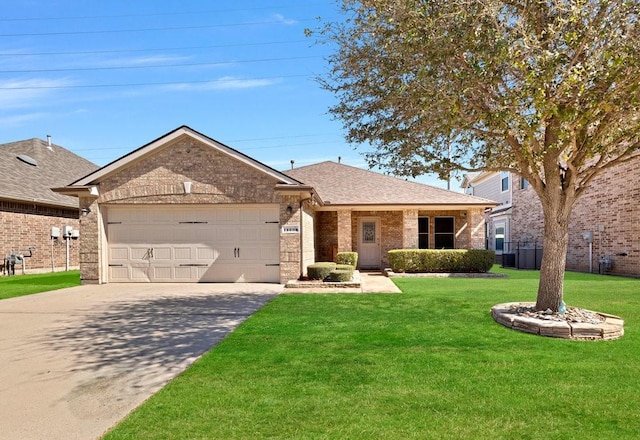 single story home featuring driveway, a shingled roof, an attached garage, a front lawn, and brick siding