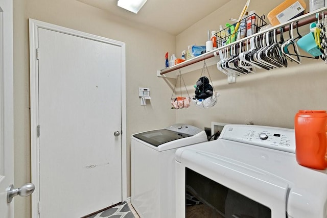 laundry area featuring laundry area and washing machine and clothes dryer