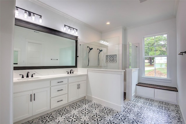 full bathroom with a walk in shower, double vanity, a sink, and crown molding