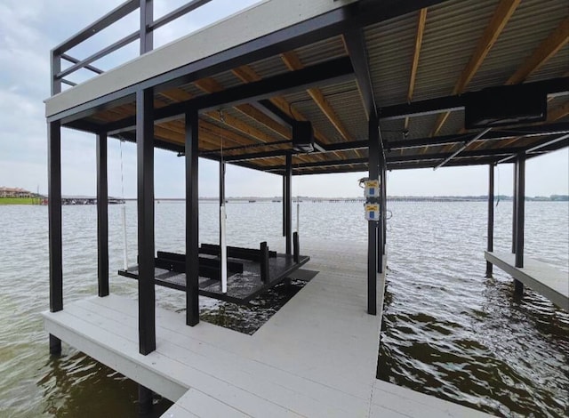 dock area featuring a water view and boat lift