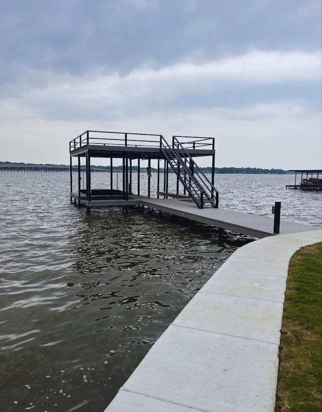 view of dock with a water view