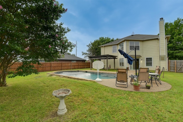 back of property with a fenced backyard, a fenced in pool, a pergola, and a yard