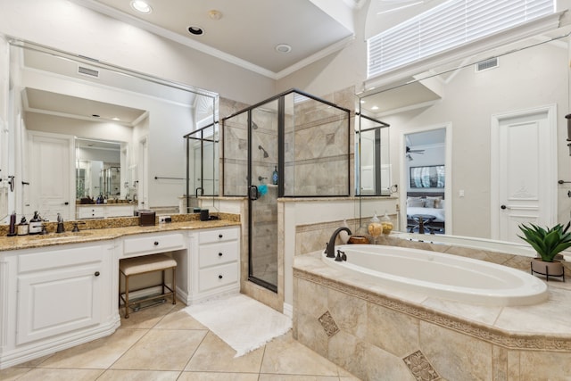 bathroom with visible vents, tile patterned floors, crown molding, vanity, and a shower stall