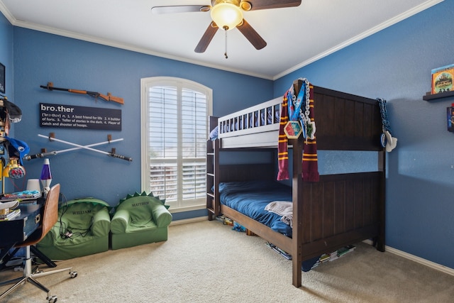 bedroom featuring ornamental molding, carpet flooring, baseboards, and a ceiling fan