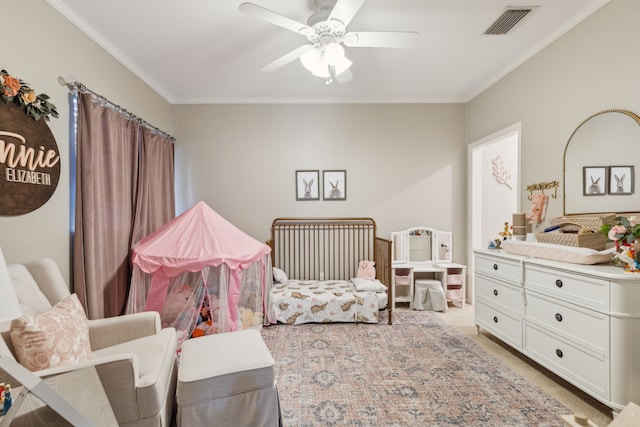 carpeted bedroom with visible vents, a ceiling fan, and ornamental molding