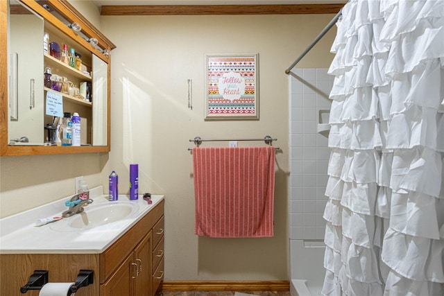 bathroom featuring shower / bathtub combination with curtain and vanity