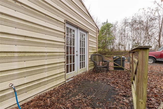 view of side of home featuring french doors