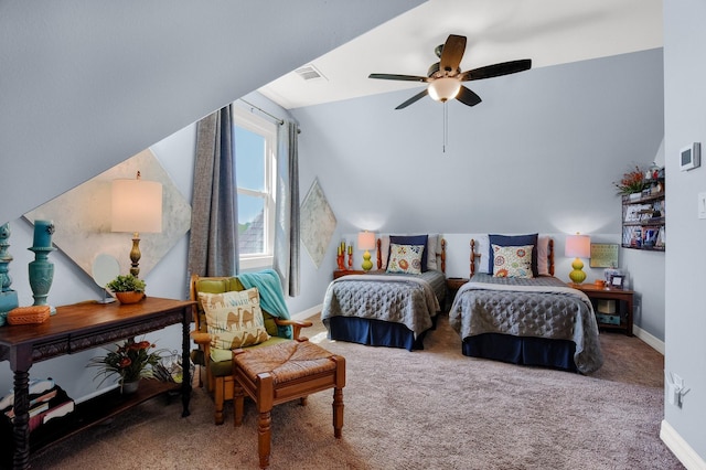 bedroom featuring carpet, baseboards, and vaulted ceiling