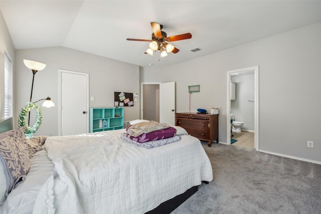 bedroom with light carpet, visible vents, a ceiling fan, connected bathroom, and lofted ceiling