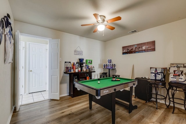 recreation room featuring billiards, baseboards, visible vents, ceiling fan, and wood finished floors