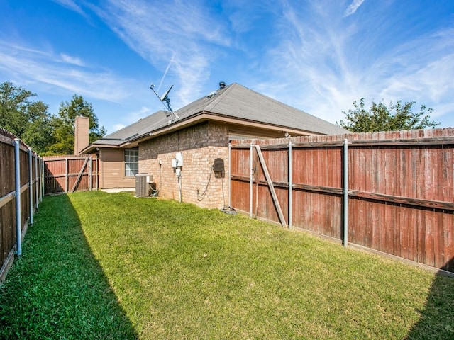 view of yard featuring cooling unit and a fenced backyard