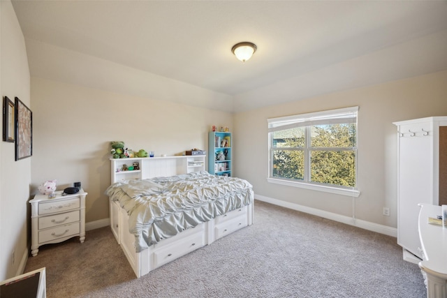 carpeted bedroom with baseboards