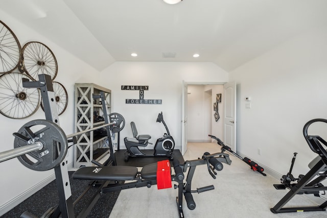 exercise area with visible vents, baseboards, vaulted ceiling, and recessed lighting