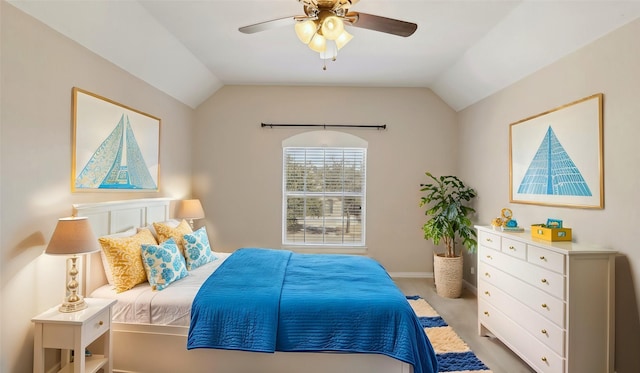 bedroom with vaulted ceiling and ceiling fan