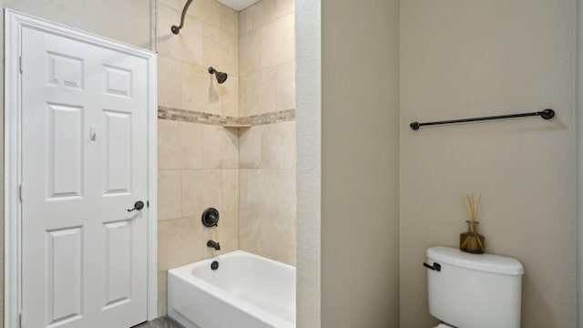 full bathroom with shower / bath combination and toilet