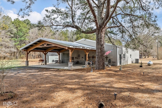 exterior space featuring a carport